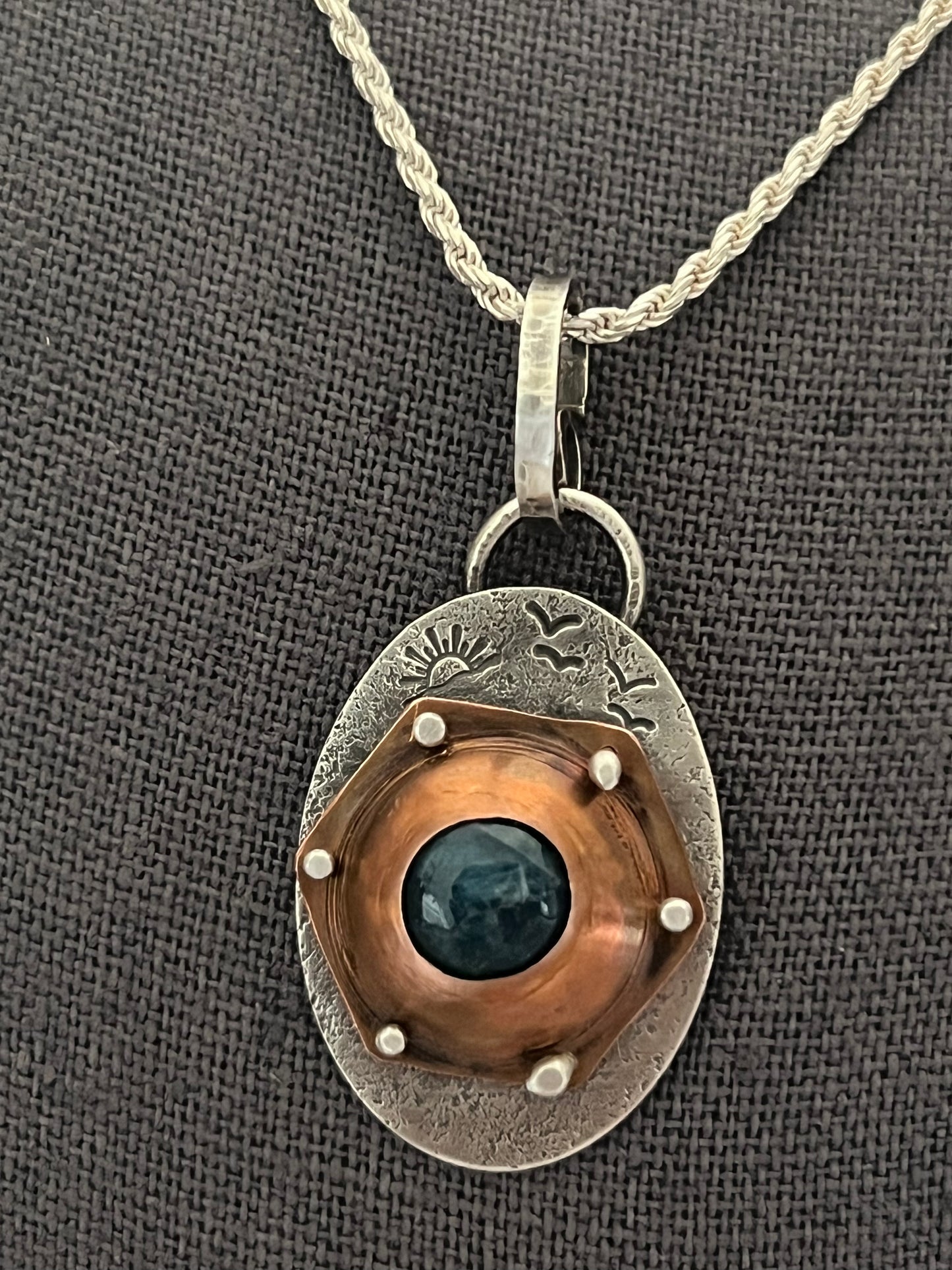 Oval Apatite with sunrise and birds