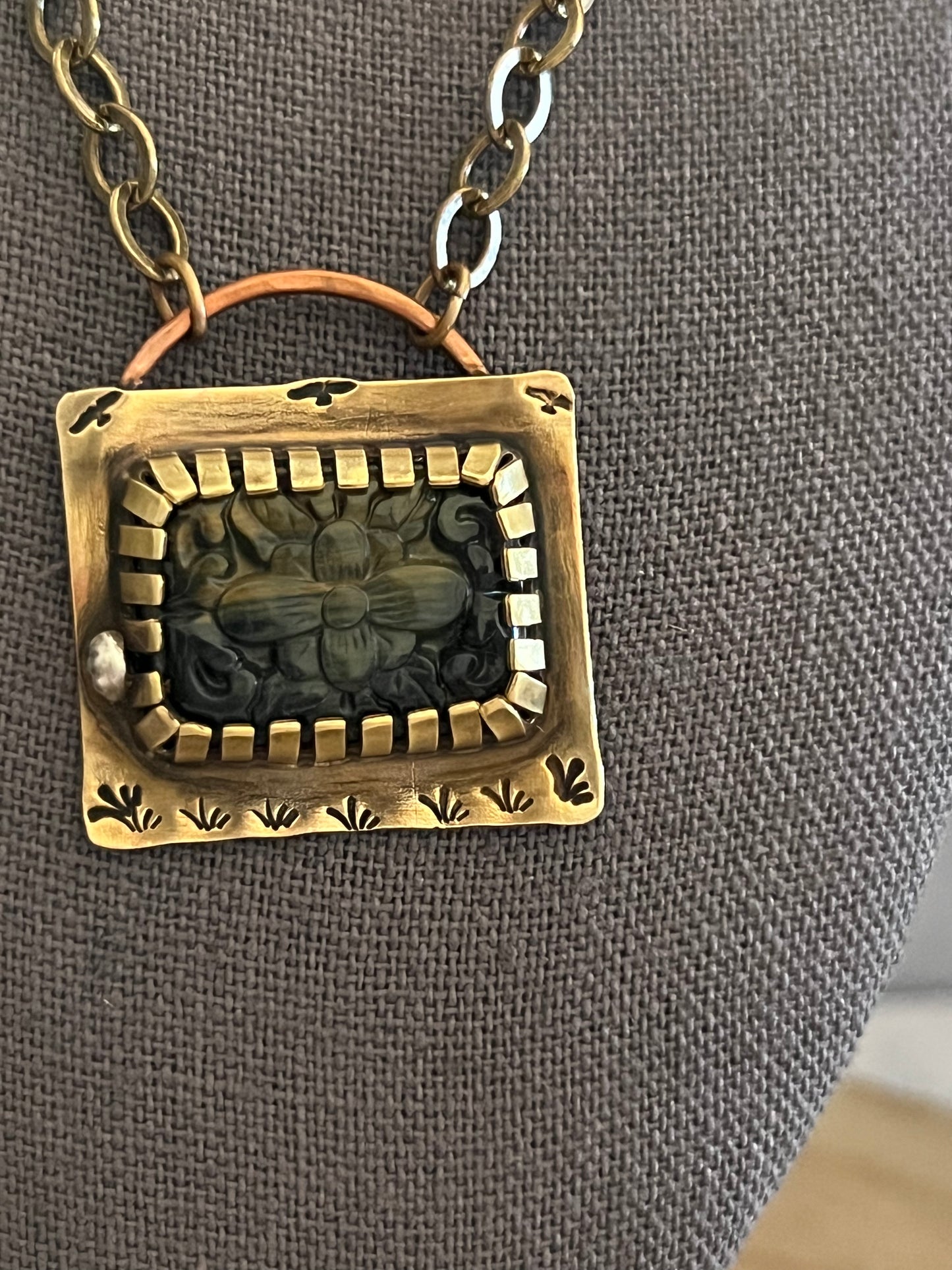 Caged tigers eye and brass
