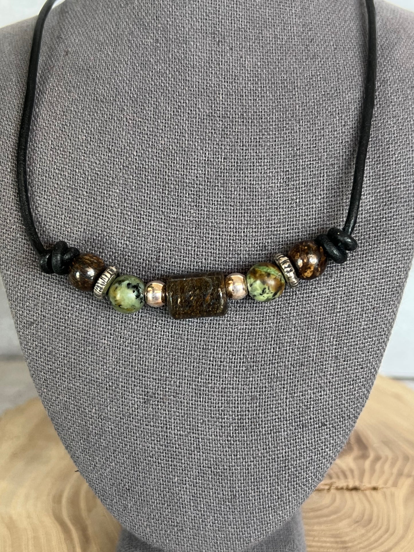 Bronzite, African turquoise and sterling silver on leather cord